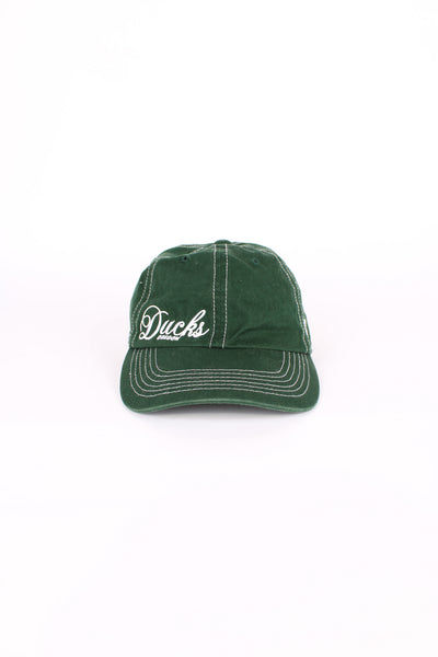 Vintage Oregon Ducks, Russell Athletic cap in green, 100% cotton, adjustable strap, embroidered logos, and has white contrast stitching throughout. 