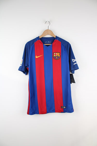 Barcelona 2016/17, Nike Football Kit in the blue and red team colourway, brand new with tag, Luis Suarez number 9 printed on the back, V-neck and has logos embroidered on the front.