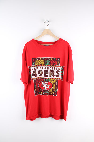 Vintage 1993 red, single stitch San Francisco 49ers t-shirt by Logo 7. Features spell-out graphic on the front and Logo 7 tab on the sleeve
