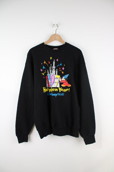 Vintage Disney World black crewneck sweatshirt with printed '1997 Happy New Year' graphic on the front