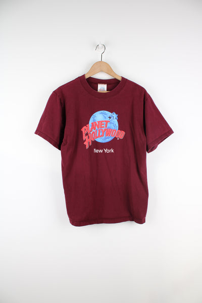 Planet Hollywood New York t-shirt in maroon, features spell-out graphic on the front