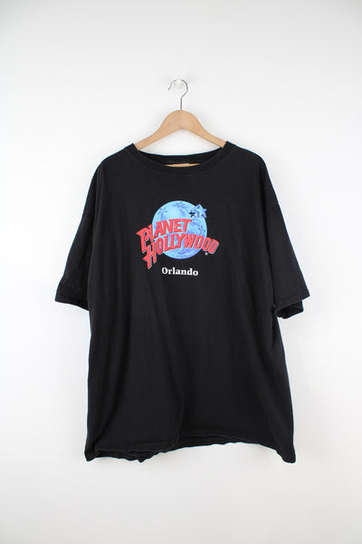 Vintage 90's made in the USA Planet Hollywood: Orlando printed t-shirt in black, features printed spell-out graphic on the front