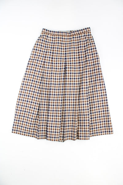 Aquascutum pleated midi skirt in classic Aquascutum check. Made from pure wool in the UK and fully lined. good condition - one very small hole at the front and one small pen mark near the hem (see photos) Size in Label: No size - Measures like a womens size 6 (XS)
