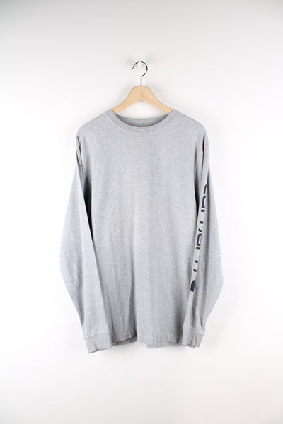 Vintage Carhartt long sleeve T-shirt in grey, plain but has Carhartt logo going down the left sleeve, as well as on the back. 