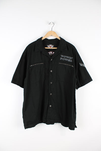 Vintage Harley Davidson Motorcycles short sleeve shirt in black, button up with a camp collar, double chest pockets, V-Twin Power embroidered on the front, and logo embroidered on the back. 