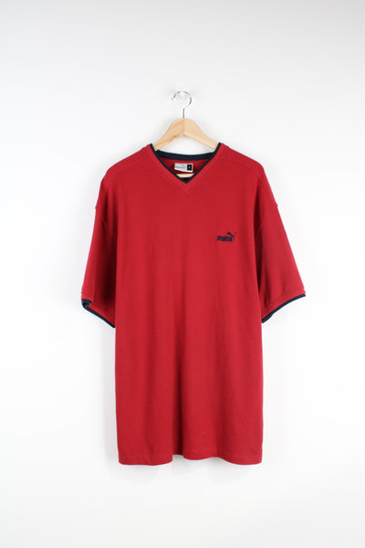 Vintage red Puma v-neck t-shirt with navy blue detail around the arms/ neck and embroidered logo. good condition Size in Label: Mens L