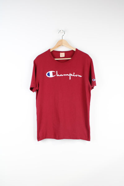 Vintage red Champion t-shirt with embroidered logo on the chest and sleeve. good condition Size in Label: Mens M 