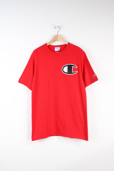Vintage red Champion t-shirt with embroidered logo on the chest and sleeve. good condition Size in Label: Mens L - Measures more like a M