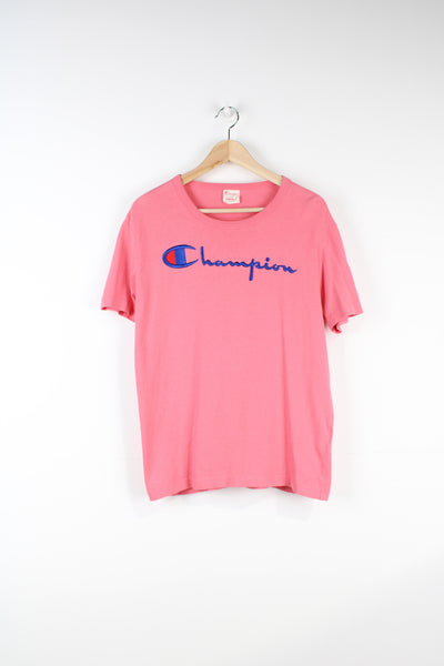 Vintage pink Champion t-shirt with embroidered logo on the chest and sleeve. good condition Size in Label: Mens M 