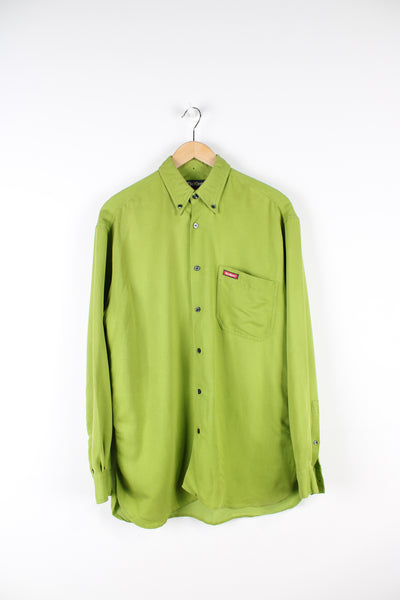 Kickers bright green button up shirt, features embroidered logo on pocket and dagger collar