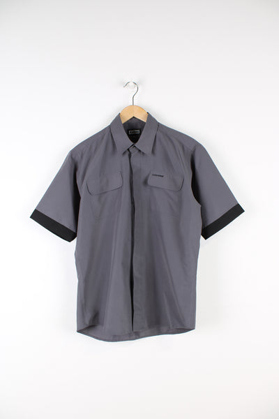 Kickers grey and black button up bowling style shirt, features embroidered logo on pocket 