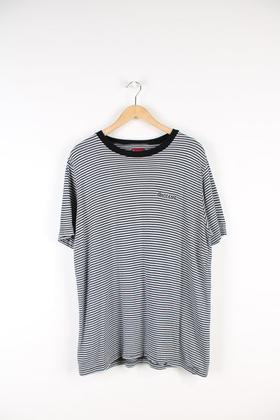 Supreme black, white and grey striped t-shirt, features embroidered spell-out on the chest