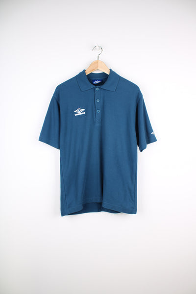 Vintage blue Umbro polo shirt with embroudered logo on the chest. good condition Size in Label: Mens S
