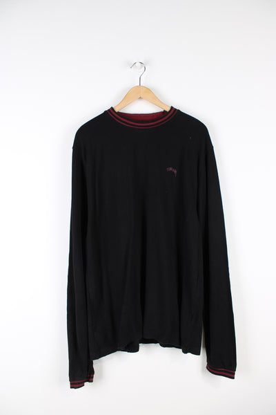 Stussy long sleeve t-shirt, features embroidered logo on the chest and maroon elasticated cuffs and collar