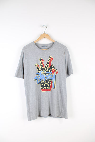 Stussy all grey t-shirt, features printed 3D crown spell-out graphic on the front
