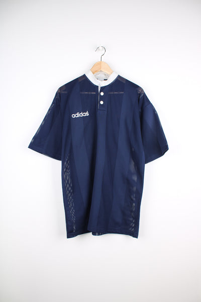 Vintage navy blue Adidas net polo shirt with flocked logo on the chest. good condition Size in Label: Mens M 