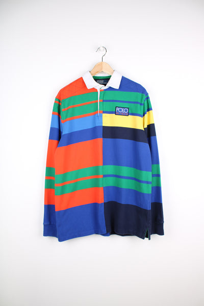 Polo by Ralph Lauren rugby shirt in multicoloured stripe print and "Polo Hi Tech" patch on the chest. good condition - very small mark on the front Size in Label: Mens M