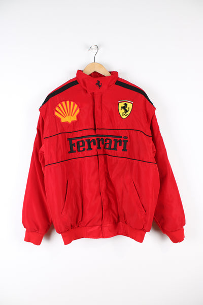 Vintage Ferrari all red cropped, bomber jacket. Features embroidered Ferrari logos throughout. Made from polyester and closes with a zip.