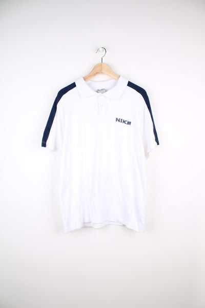 Vintage Nike white polo shirt with embroidered spellout logo on the chest. good condition - some light bobbling Size in Label: Mens L