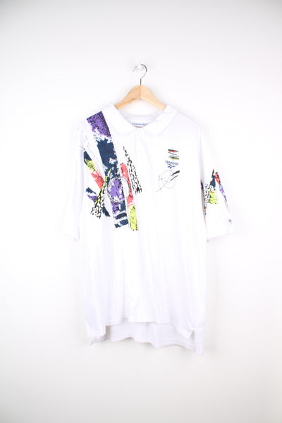 Vintage Reebok white polo shirt with abstract design on the front/ back and embroidered logo on the chest. good condition Size in Label: Mens XL