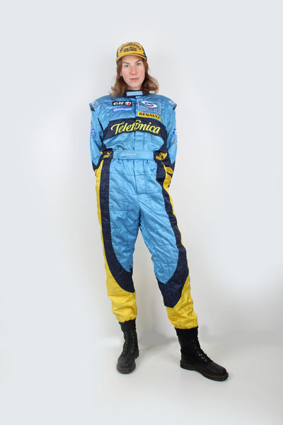 Pit Crew Overalls made by Puma and used during the 2006 world championship winning season. Race drivers for 2006 were Fernando Alonso and Giancarlo Fisichella.  Blue and yellow jumpsuit with embroidered sponsors.