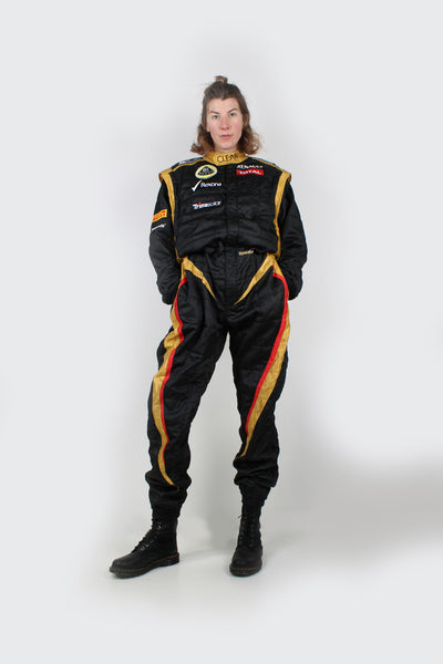 F1 Pit Crew Overalls, 2012 season for Lotus in black, gold and red with embroidered sponsors through out.  good condition