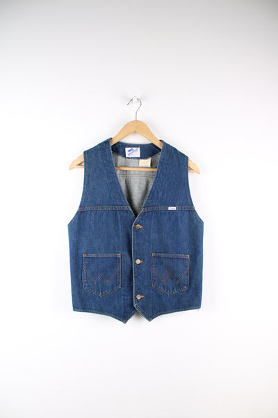 Vintage 1980's 'no fault' Wrangler denim vest in blue, button up with two pockets on the front and embroidered logo on the chest
