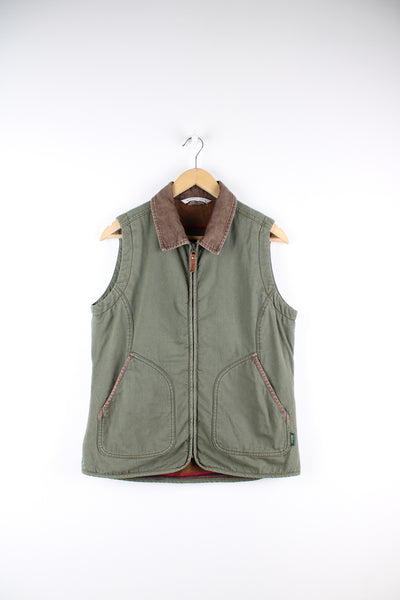Forest green heavy duty cotton Woolrich workwear gilet, features striped fleece lining and corduroy collar