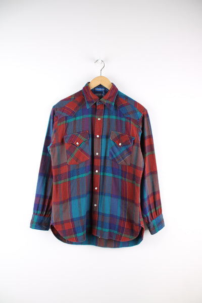 Vintage Pendleton high grade Western wear, plaid wool shirt, features pearl snap buttons