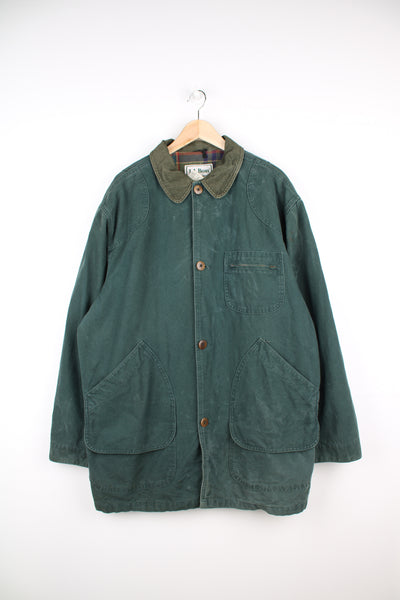 Vintage 1990's L.L. Bean forest green denim button up chore jacket features cotton lining and corduroy collar