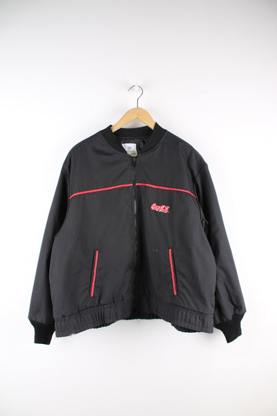 Coca Cola employee black zip through bomber jacket, features embroidered logo on the chest and back of shoulders