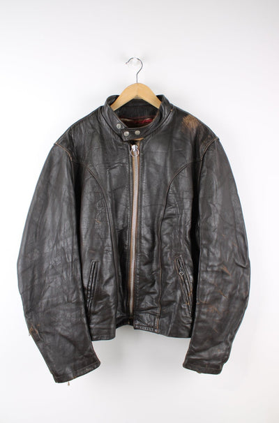 Vintage Schott NYC dark brown leather racer jacket, features removable liner, zip up pockets and adjustable bucklesVintage Schott NYC dark brown leather racer jacket, features removable liner, zip up pockets and adjustable buckles
