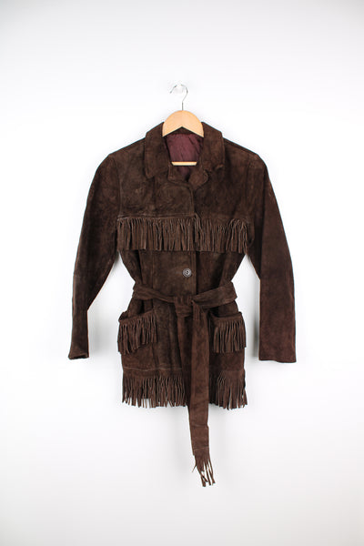 Vintage 1970s western style chocolate brown suede  jacket. Features belt, fringe detailing across the shoulders and down the sleeves and buttons for closure