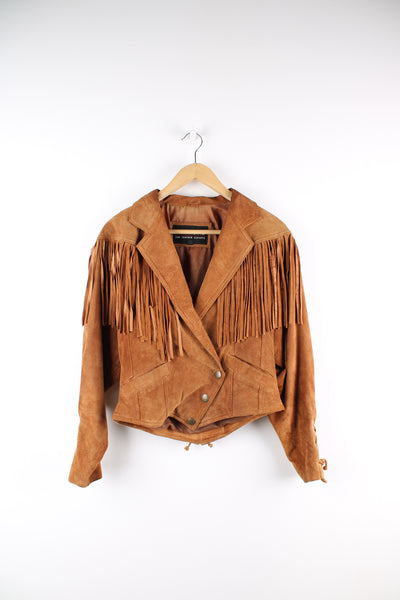 Vintage Wilson's tan suede leather jacket with fringe details on the back of the shoulders