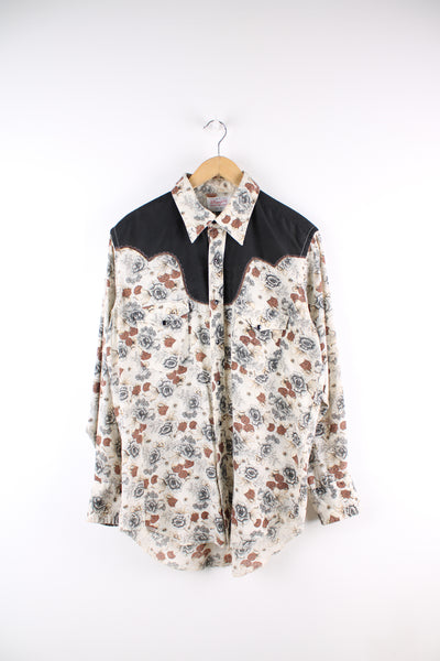 Vintage Wrangler Permanent Press pearl snap, button up cotton shirt. Features floral pattern and black contrast yoke