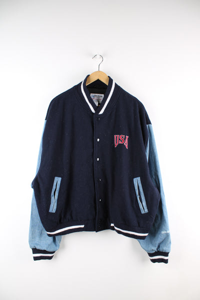 Vintage USA workwear varsity jacket in blue, woollen with denim sleeves, button up, pockets either side and USA embroidered on the front. 