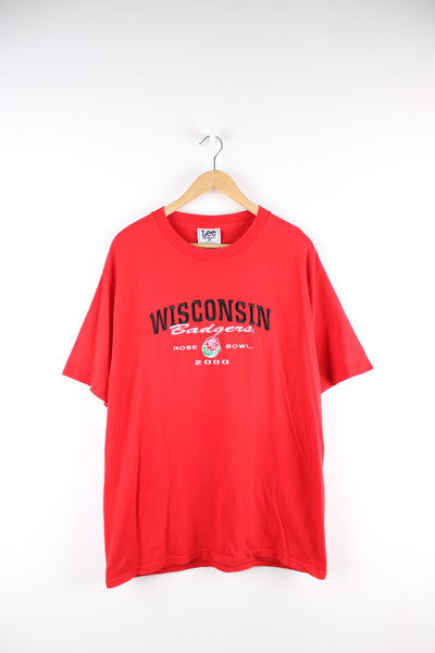 Wisconsin Badgers NFL t-shirt in red, has embroidered spell out and logo on the front. 