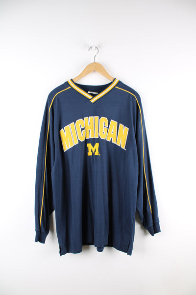 Vintage Lee Sport, Michigan University long sleeve t-shirt, blue and yellow team colourway, v neck with embroidered spell out and logo on the front. 