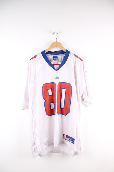 Vintage New York Giants NFL, Reebok jersey in the white, blue and orange team colourway, with Jeremy Shockey number 80 on the back. 