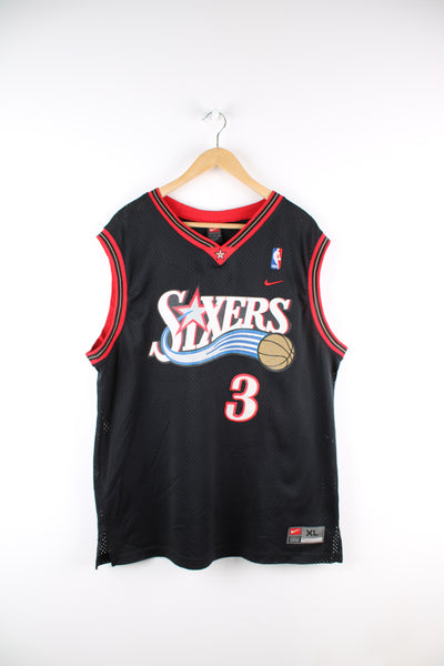 Vintage NBA Philadelphia 76ers, Nike jersey in the black and red team colourway, embroidered logos on the front and Allen Iverson number 3 on the back. 