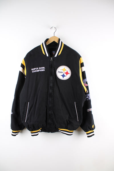 Vintage NFL Pittsburgh Steelers, Super Bowl Champions varsity jacket in black, heavy cotton with a quilted lining, zip up, side pockets, and has embroidered badges through the jacket.