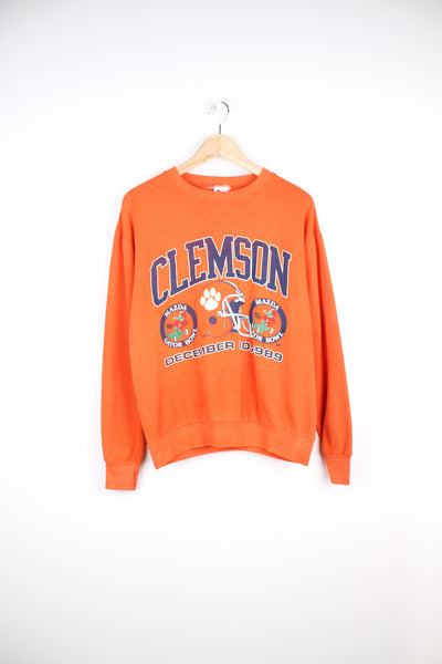 Vintage 1989 Gator Bowl Clemson Tigers orange sweatshirt with printed graphic on the front. good condition - very faint mark on the back of the neck and some cracking to the graphic (see photos) Size in Label:  Mens M 