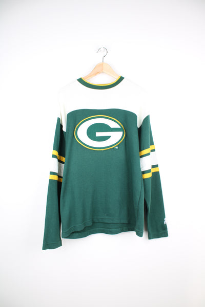 Vintage Green Bay Packers sweatshirt with felt patch logo on the front and embroidered "Packers" on the back of the neck. Made by Starter. good condition - very faint mark on the back of the neck and some cracking to the graphic (see photos) Size in Label:  Mens M