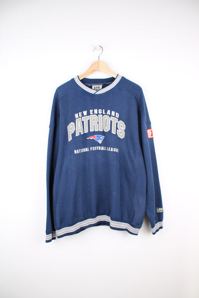 Vintage New England Patriots sweatshirt with embroidered team logo on the front. Made by Lee Sport. good condition - some small paint marks on the sleeve and front (see photos) Size in Label:  Mens XL