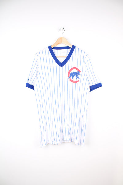Vintage Majestic Chicago Cubs ringer t-shirt. Features blue pinstripe pattern and printed Cubs logo on the chest and #12 on the back.  good condition - some cracks to the graphic (see photos) Size in Label:  Measures more like a Mens M 