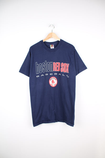 Vintage 1994 Boston Red Sox navy blue t-shirt made by Fruit of the Loom. Features printed graphic on the front and single stitch seams. good condition - Faint mark on the front side (see photos) Size in Label:  Mens M 