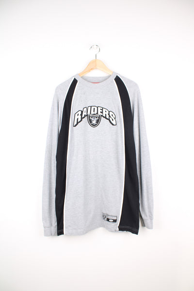 Oakland (now Las Vegas) Raiders grey long sleeve t-shirt made by NFL. Features embroidered logo on the front good condition - Faint mark on the front side (see photos) Size in Label:  Mens L