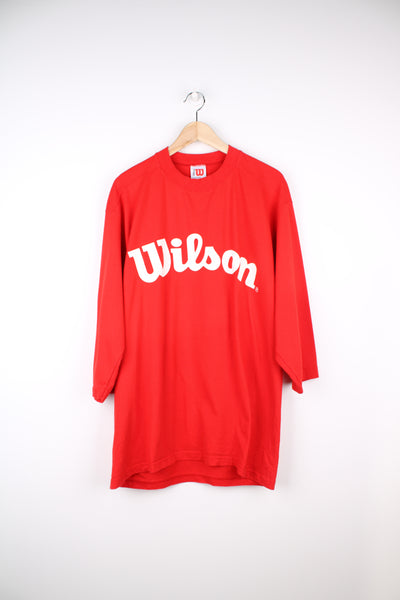 Vintage Wilson T-Shirt in a red and white colourway, crewneck with quarter length sleeves, has logo spell out printed across the front.
