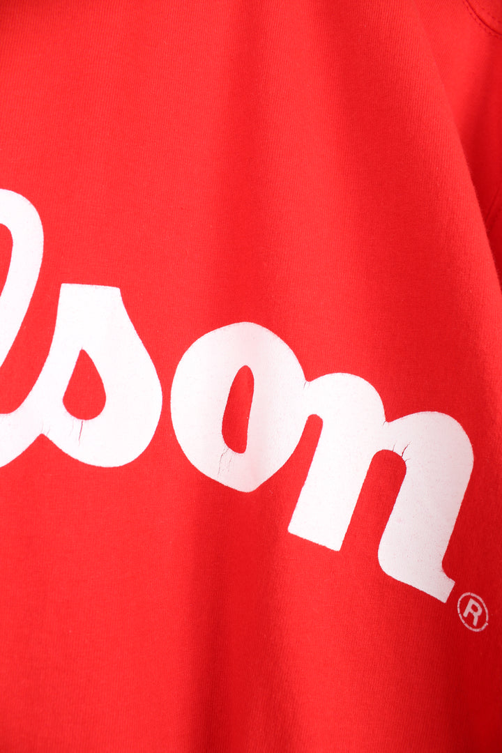 Vintage Wilson T-Shirt in a red and white colourway, crewneck with quarter length sleeves, has logo spell out printed across the front.