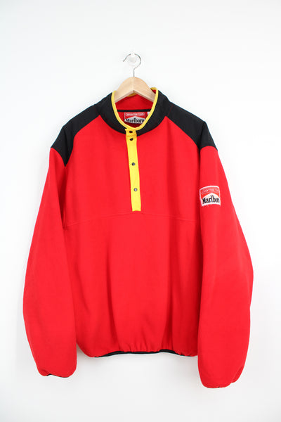 Vintage 1990s Marlboro Adventure Team red pullover fleece with popper fastenings and embroidered badge on the shoulder 